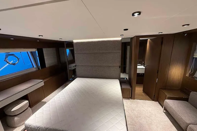 Karya Yacht Photos Pics Luxurious bedroom interior of 2023 Ferretti Yachts 780 with modern design and elegant furnishings.
