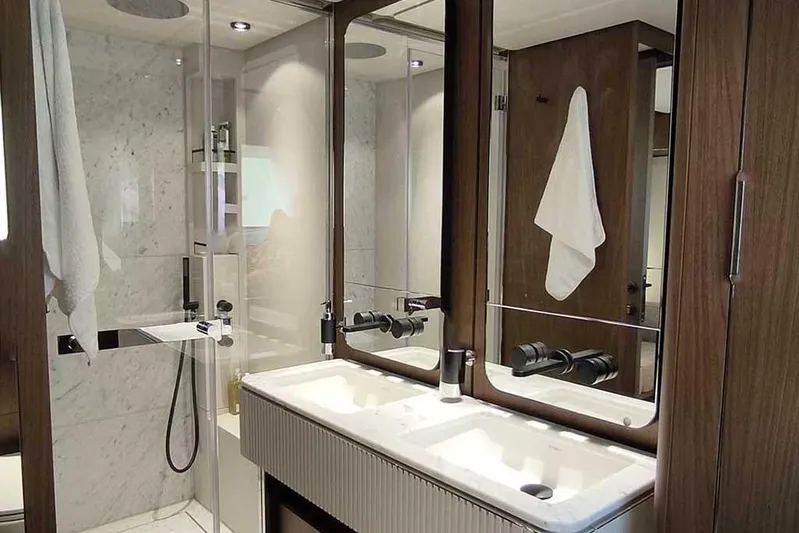 Karya Yacht Photos Pics Luxurious bathroom in 2023 Ferretti Yachts 780, featuring elegant fixtures and marble accents.