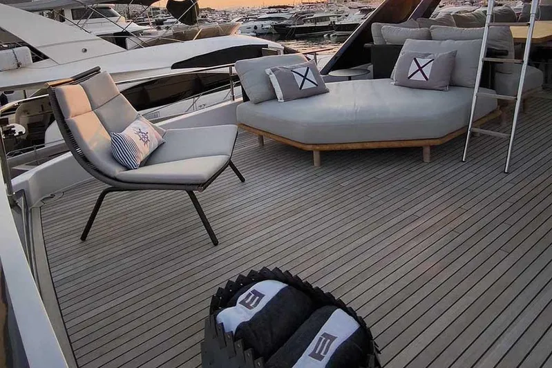 Karya Yacht Photos Pics Luxurious deck of 2023 Ferretti Yachts 780 with elegant seating and cushions.