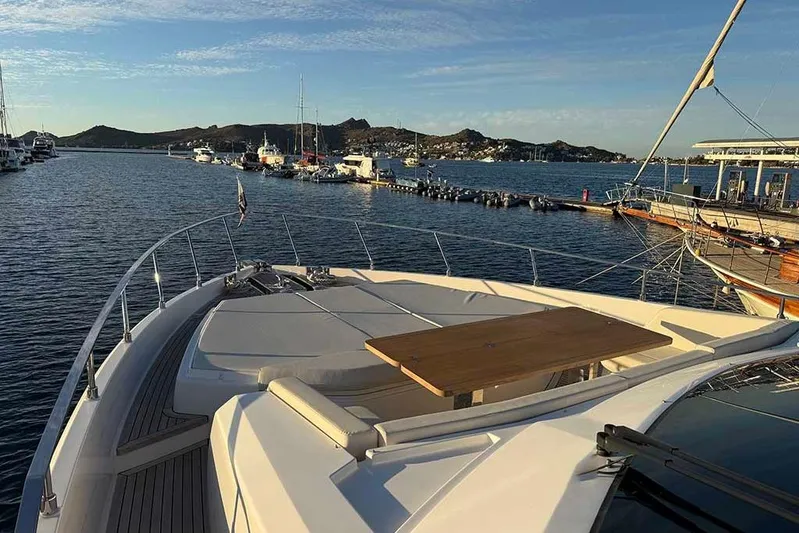 Karya Yacht Photos Pics Luxury Ferretti Yachts 780, 2023 model, docked in scenic marina at sunset.
