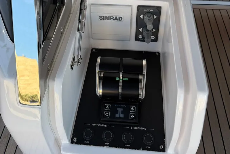 Karya Yacht Photos Pics Control panel of 2023 Ferretti Yachts 780 with Simrad and Sleipner systems.