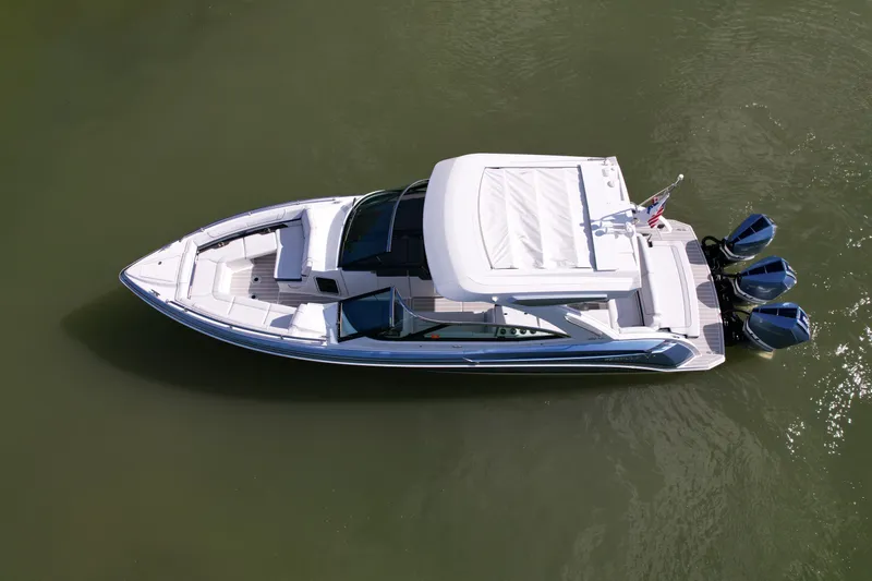 Sea Smoke Yacht Photos Pics Aerial view of a 2023 Formula 330 CBR boat on the water.