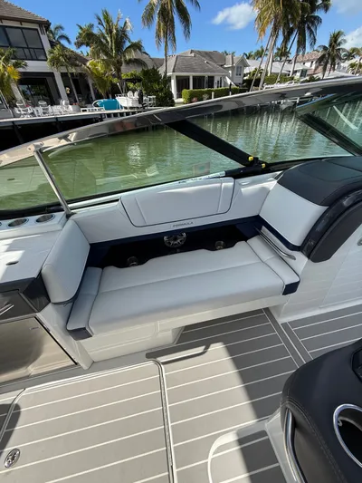 Sea Smoke Yacht Photos Pics Interior of a 2023 Formula 330 CBR yacht with luxurious seating.