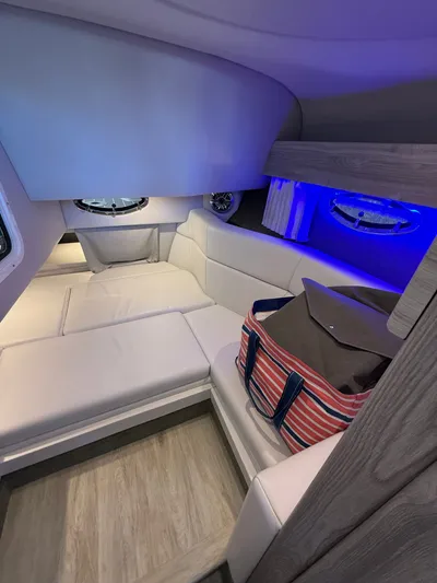 Sea Smoke Yacht Photos Pics Interior of 2023 Formula 330 CBR yacht with blue lighting.