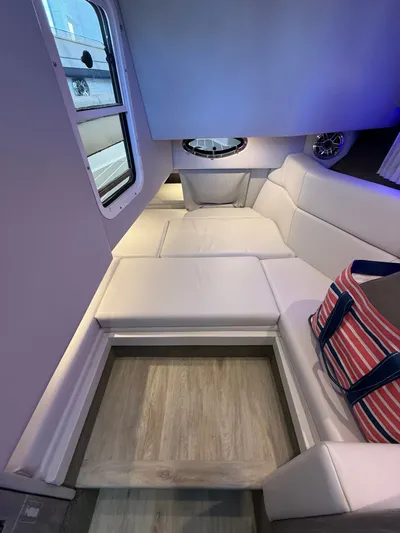 Sea Smoke Yacht Photos Pics Interior of 2023 Formula 330 CBR with white upholstery.
