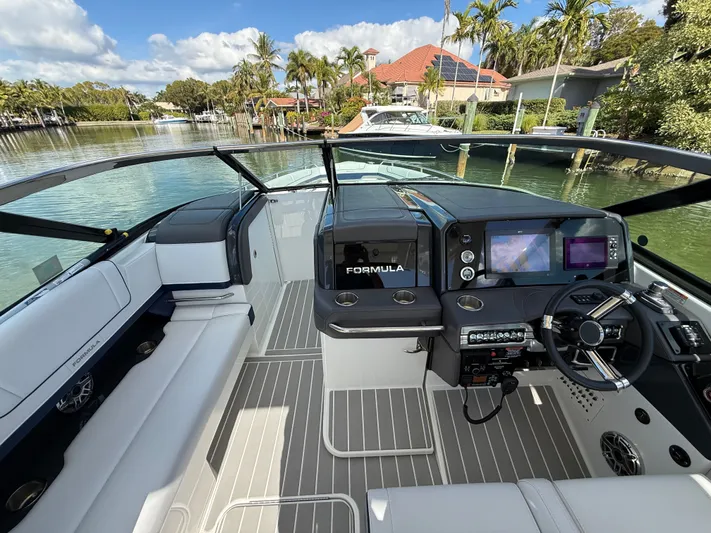 Sea Smoke Yacht Photos Pics Interior view of 2023 Formula 330 CBR boat with modern features.
