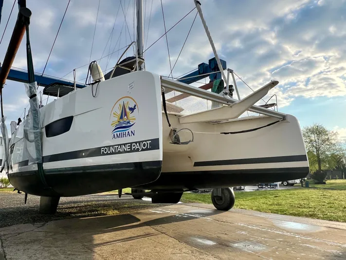 Amihan Yacht Photos Pics 2023 Fountaine Pajot Isla 40 catamaran on land, showcasing sleek design and modern features.