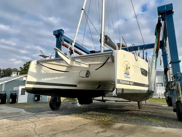 Amihan Yacht Photos Pics 2023 Fountaine Pajot Isla 40 catamaran on a lift, ready for launch.