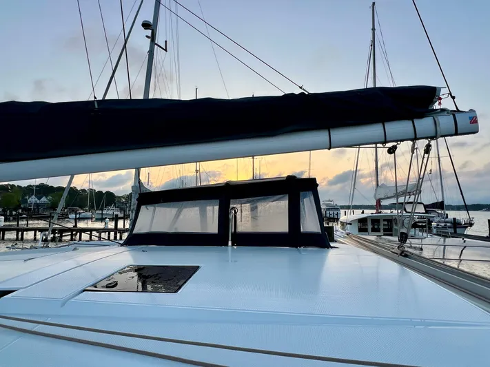 Amihan Yacht Photos Pics 2023 Fountaine Pajot Isla 40 catamaran docked at sunset, showcasing sleek design and modern features.