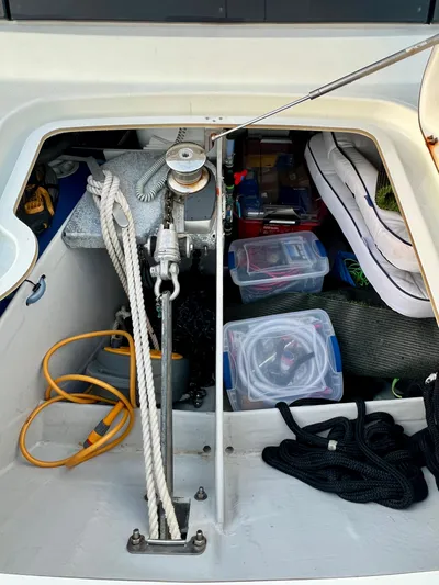 Amihan Yacht Photos Pics Storage compartment of 2023 Fountaine Pajot Isla 40 catamaran with ropes and equipment.