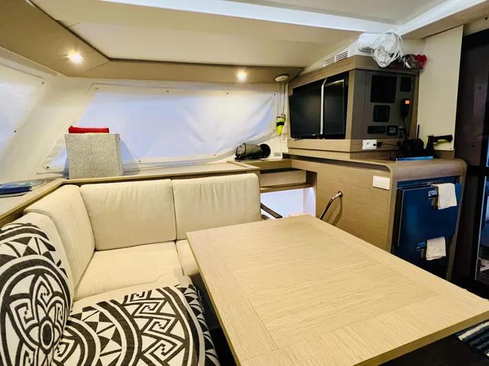Amihan Yacht Photos Pics Interior of 2023 Fountaine Pajot Isla 40 catamaran with modern seating and entertainment area.
