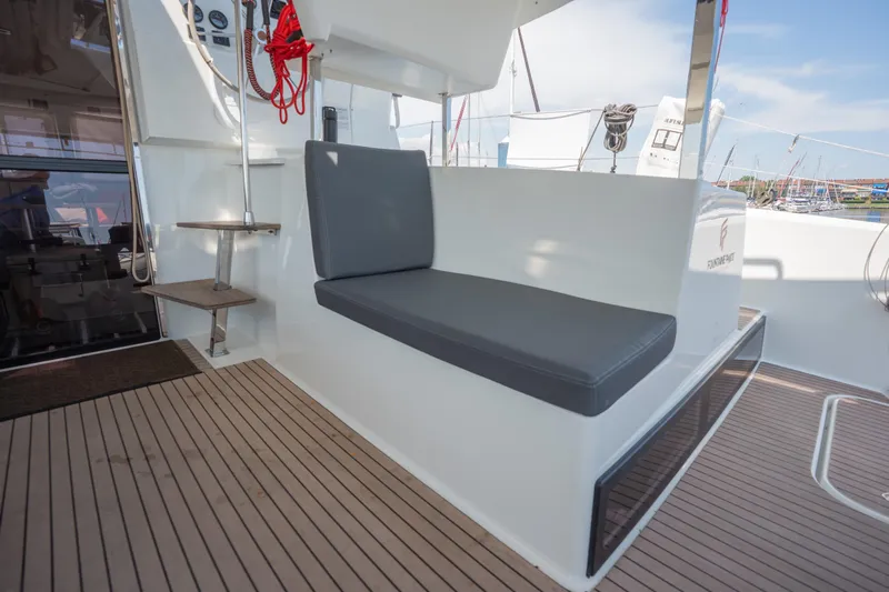 Amihan Yacht Photos Pics 2023 Fountaine Pajot Isla 40 yacht deck with cushioned seating and modern design.