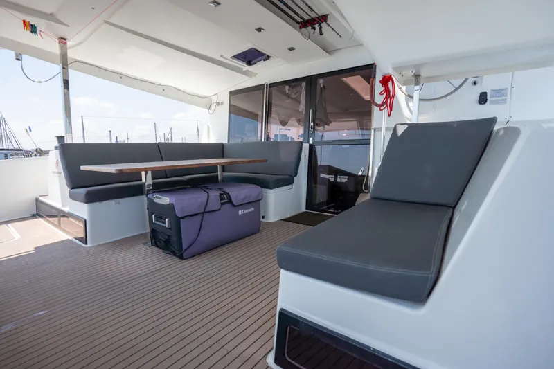 Amihan Yacht Photos Pics 2023 Fountaine Pajot Isla 40 yacht interior with seating and table on deck.
