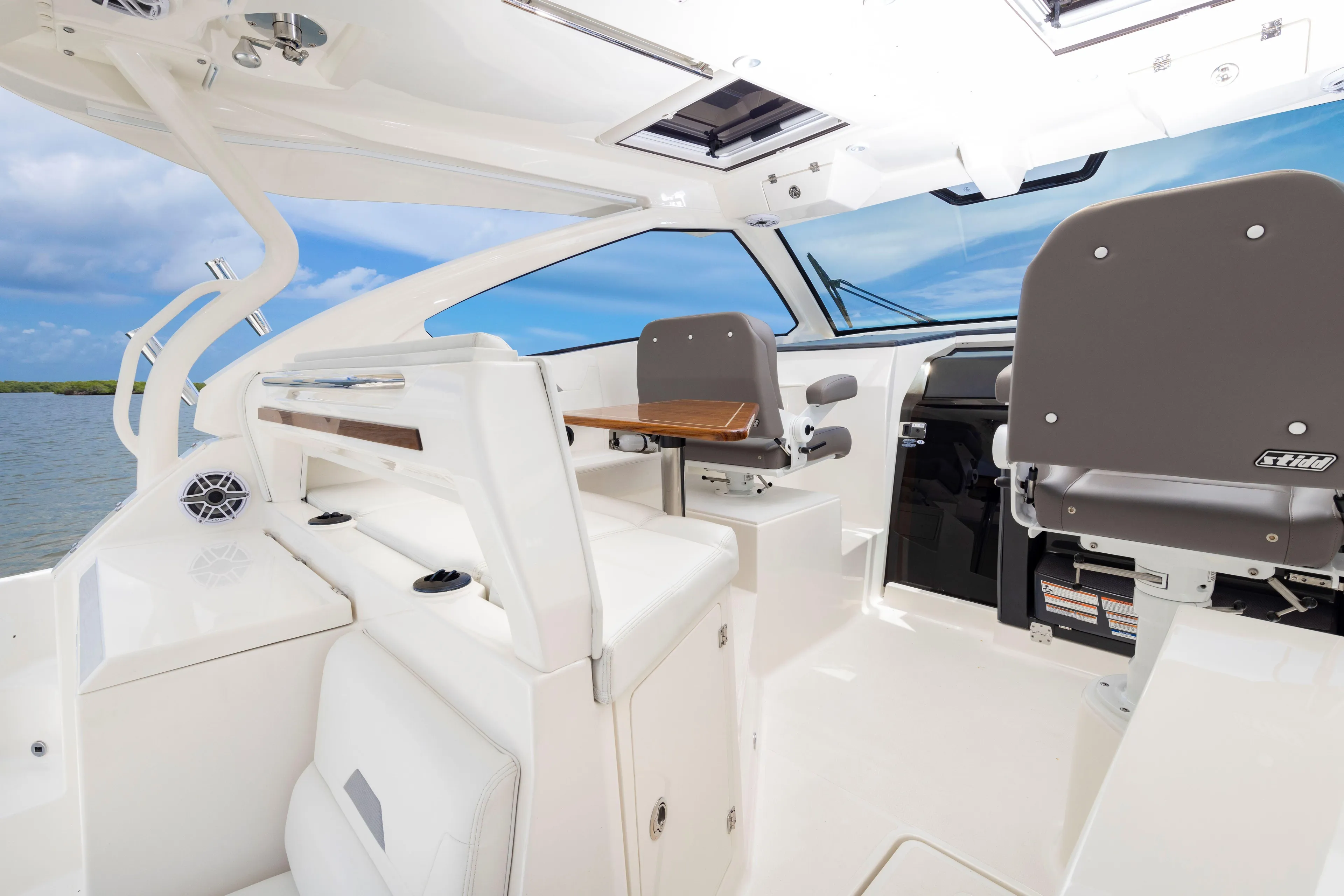 2026 Pursuit OS 405 Offshore boat interior with modern seating and sleek design.