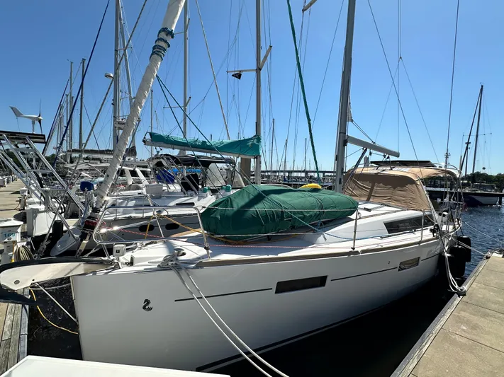 Yes My Dear Yacht Photos Pics 2012 Beneteau Oceanis 41 sailboat docked at marina under clear blue sky.