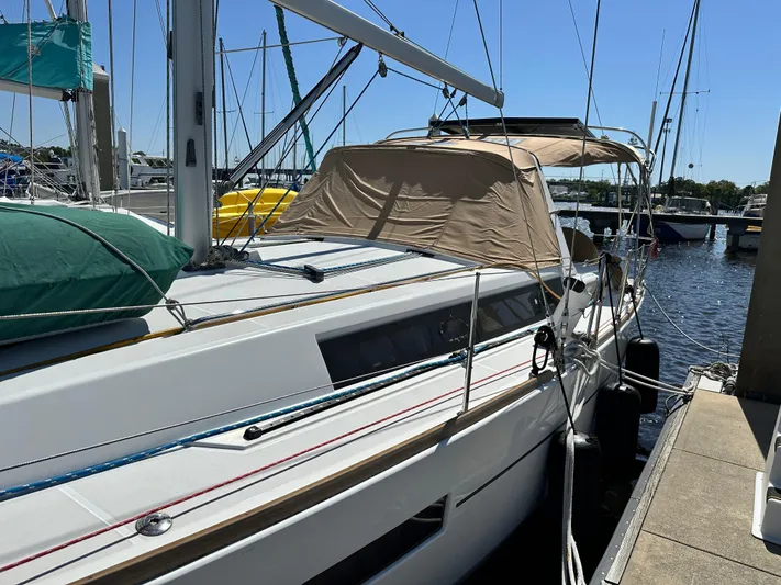Yes My Dear Yacht Photos Pics 2012 Beneteau Oceanis 41 sailboat docked at marina under clear blue sky.