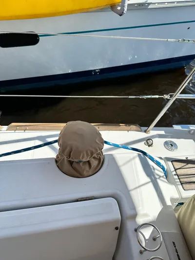 Yes My Dear Yacht Photos Pics Beneteau Oceanis 41 sailboat deck, 2012 model, with mooring lines and covered winch.