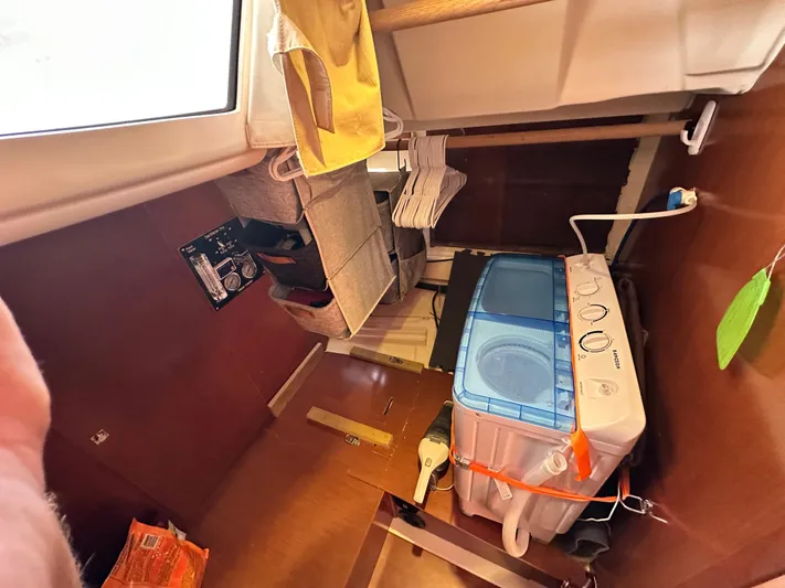 Yes My Dear Yacht Photos Pics Interior of 2012 Beneteau Oceanis 41 yacht with compact washing machine.