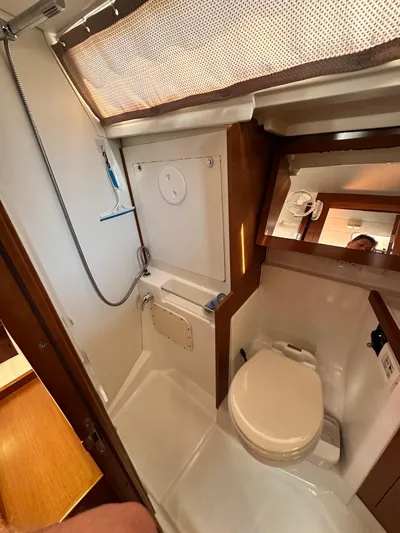Yes My Dear Yacht Photos Pics Beneteau Oceanis 41 (2012) yacht bathroom with shower and toilet.