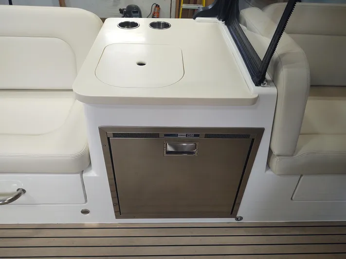 Coco Yacht Photos Pics MJM 3z 2022 boat interior with sink and storage compartment.