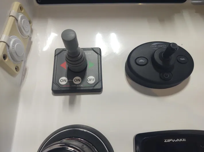 Coco Yacht Photos Pics Control panel of 2022 MJM 3z boat with joystick and switches.