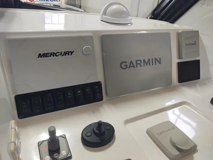Coco Yacht Photos Pics Control panel of 2022 MJM 3z boat featuring Mercury and Garmin systems.