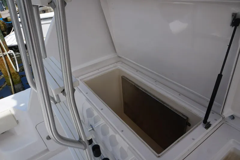 Sea Striker Yacht Photos Pics Open storage compartment on 2005 Mirage Yachts 40 Convertible boat deck.