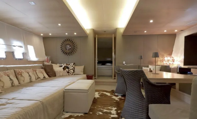  Yacht Photos Pics Luxurious interior of 2006 Mangusta 80 yacht with elegant seating and modern decor.