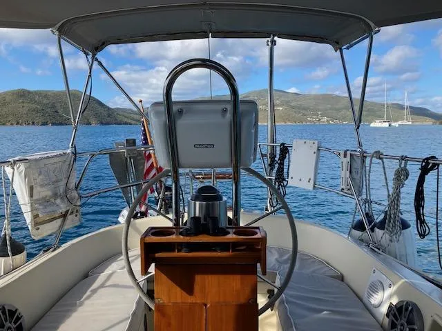 Hero Yacht Photos Pics 1992 Pacific Seacraft 37 Cutter sailboat cockpit with scenic ocean view.