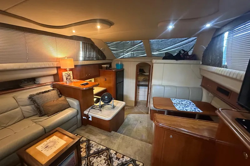 Busy Living Yacht Photos Pics Luxurious interior of 2005 Cruisers Yachts 375 Motoryacht with cozy seating and elegant decor.