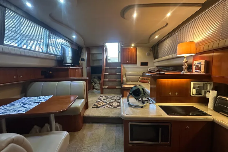 Busy Living Yacht Photos Pics Luxurious interior of 2005 Cruisers Yachts 375 Motoryacht with modern amenities and elegant design.