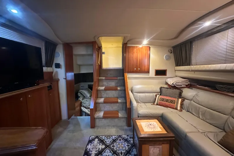 Busy Living Yacht Photos Pics Luxurious interior of 2005 Cruisers Yachts 375 Motoryacht with cozy seating and elegant decor.