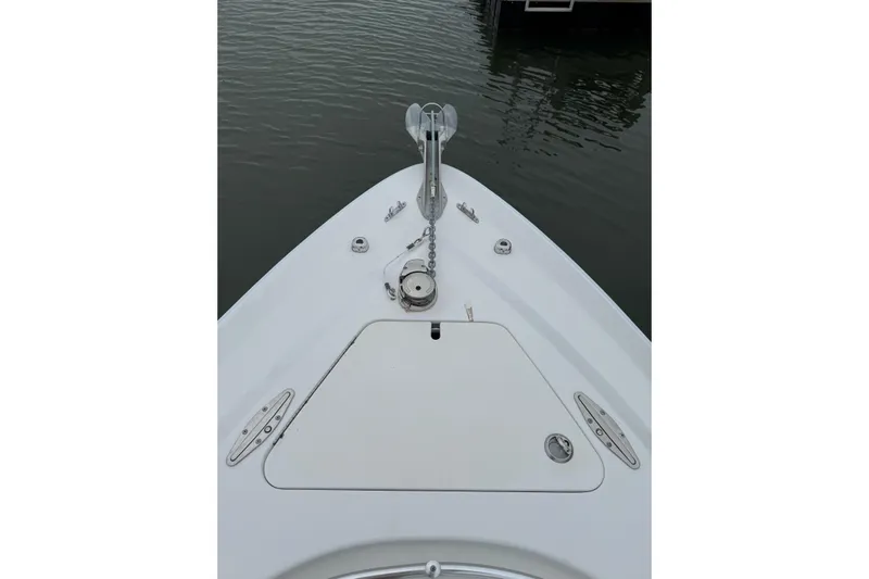  Yacht Photos Pics Bow view of 2008 Contender 36 Fisharound boat with anchor and hatch.