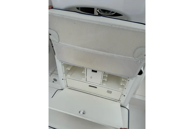  Yacht Photos Pics 2008 Contender 36 Fisharound boat storage compartment with open hatch and organized interior.