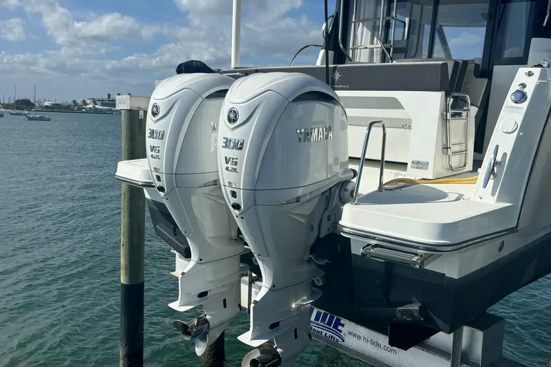 1095-953 Brokerage Josh Yacht Photos Pics 2024 Jeanneau NC Weekender 1095 Fly with dual Yamaha 300 V6 outboard engines.