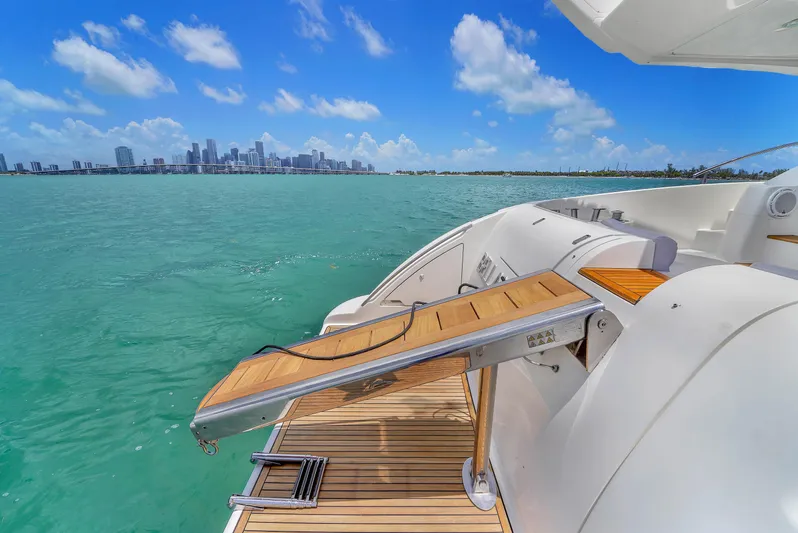 Bellami Too Yacht Photos Pics Luxurious 2008 Azimut 62E yacht with scenic ocean view and city skyline.