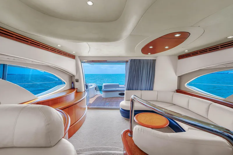 Bellami Too Yacht Photos Pics Luxurious interior of 2008 Azimut 62E yacht with ocean view and elegant furnishings.