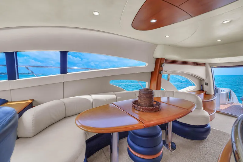 Bellami Too Yacht Photos Pics Luxurious interior of 2008 Azimut 62E yacht with ocean view and elegant seating area.