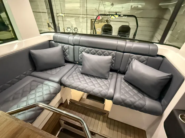 Tiny Dancer Yacht Photos Pics Luxurious seating area in 2020 Axopar 37 XC boat with quilted cushions.