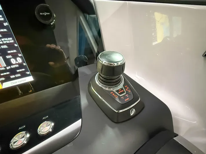 Tiny Dancer Yacht Photos Pics Control panel of 2020 Axopar 37 XC boat with joystick and display.
