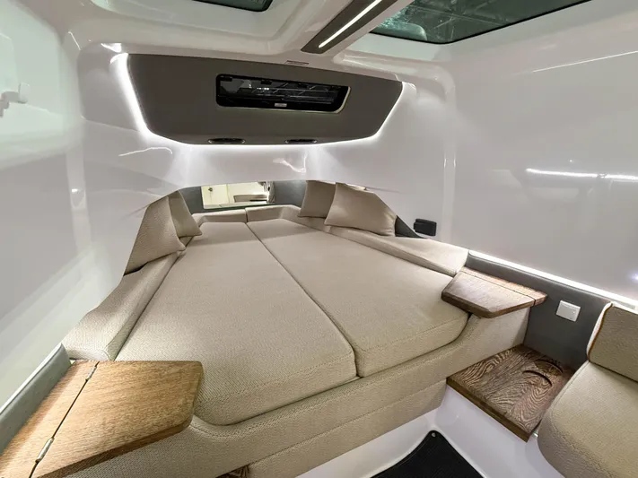 Tiny Dancer Yacht Photos Pics Luxurious interior cabin of 2020 Axopar 37 XC with modern design and comfortable seating.