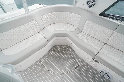 R&r 5 Yacht Photos Pics Luxurious seating area on 2022 Intrepid 477 Evolution boat with white upholstery.