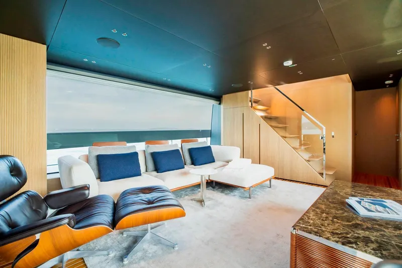  Yacht Photos Pics Luxurious interior of 2024 Sanlorenzo SX100 yacht with modern seating and elegant design.