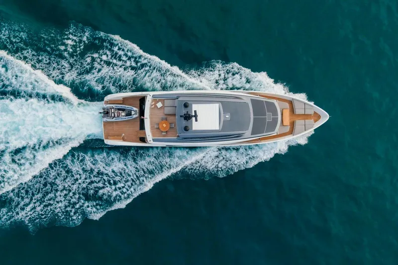  Yacht Photos Pics Aerial view of 2024 Sanlorenzo SX100 yacht cruising on open water.