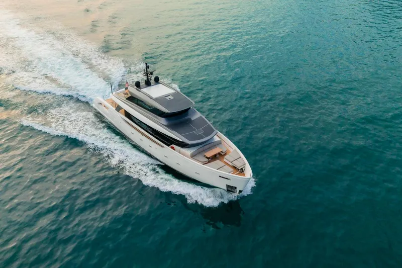  Yacht Photos Pics 2024 Sanlorenzo SX100 yacht cruising on open water.