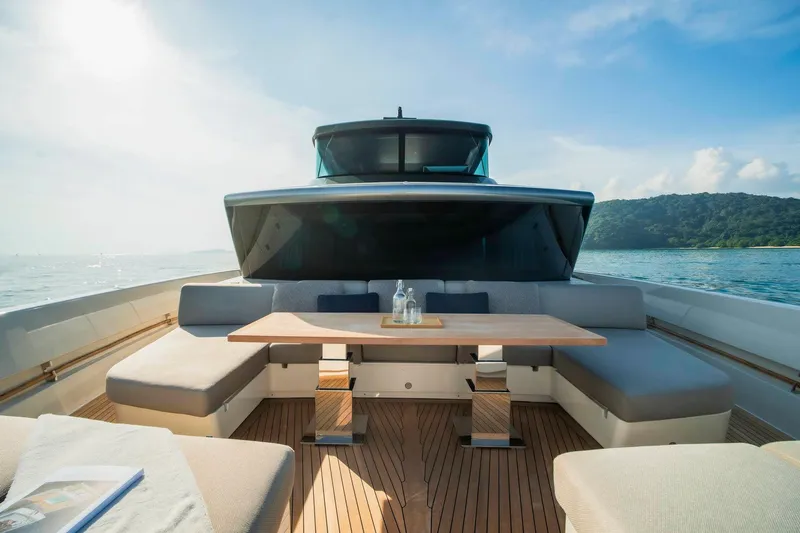 Yacht Photos Pics Luxurious 2024 Sanlorenzo SX100 yacht deck with elegant seating and ocean view.