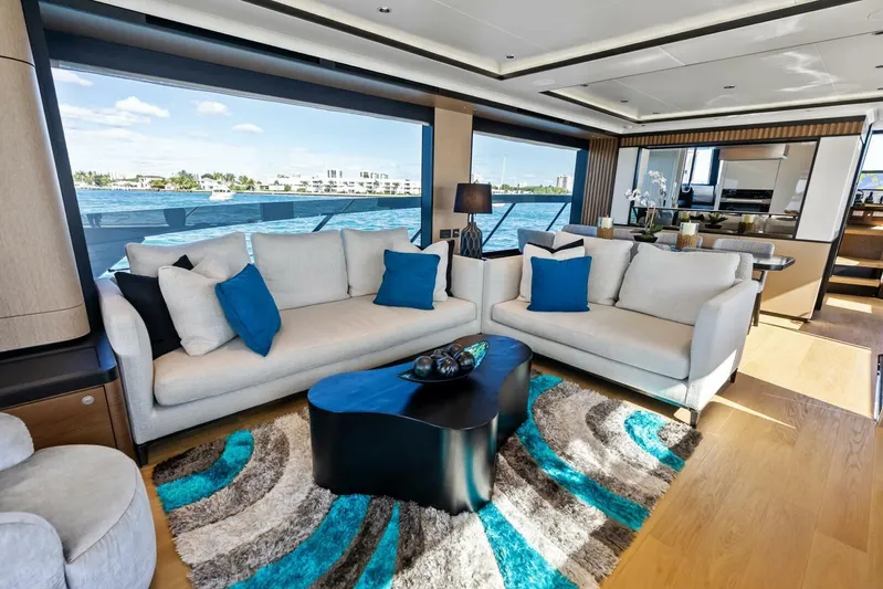 Fantasy Girl Yacht Photos Pics Luxurious interior of 2025 Absolute 75 Navetta yacht with modern decor and ocean view.