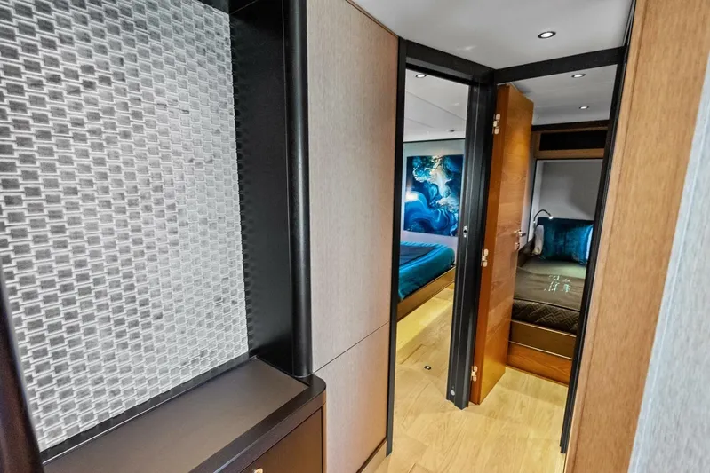 Fantasy Girl Yacht Photos Pics Luxurious interior of 2025 Absolute 75 Navetta yacht with modern design and elegant furnishings.