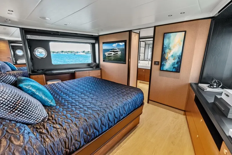 Fantasy Girl Yacht Photos Pics Luxurious bedroom interior of 2025 Absolute 75 Navetta yacht with ocean view.