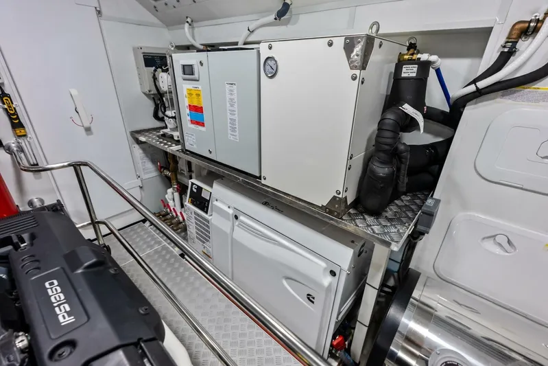 Fantasy Girl Yacht Photos Pics Engine room of 2025 Absolute 75 Navetta yacht, featuring advanced machinery and equipment.